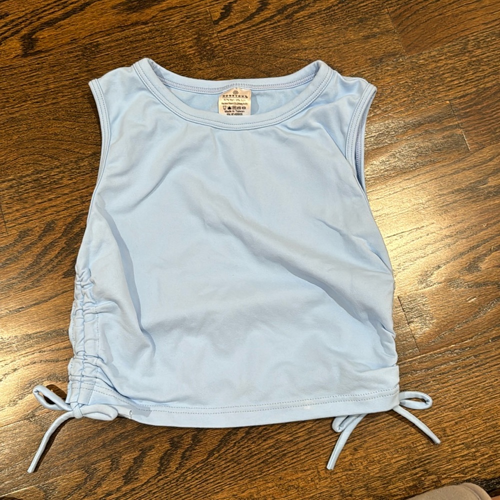 Honeycutt official side tie baby blue top AXXS